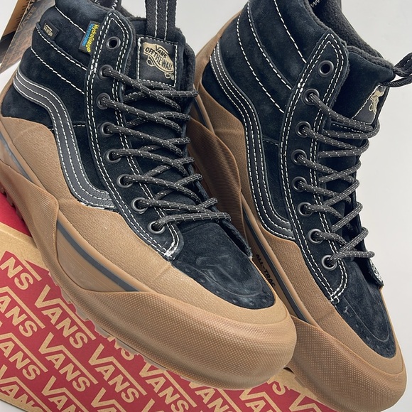 Vans Men’s Sk8-Hi Dip Mte-2
Black/Gum
VN0009QKB9M
Boots Cold Weather Sneakers - Picture 8 of 16